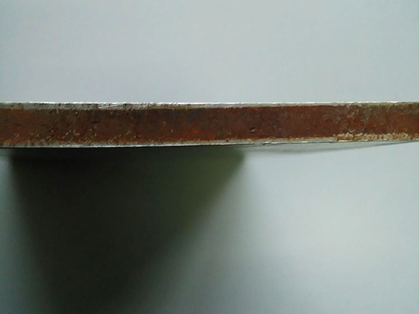 Double-sided stainless steel composite board